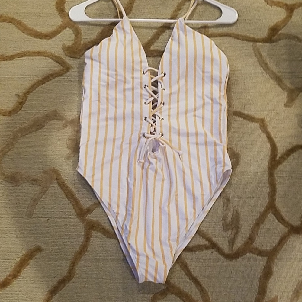 Yellow sripped one piece suit
